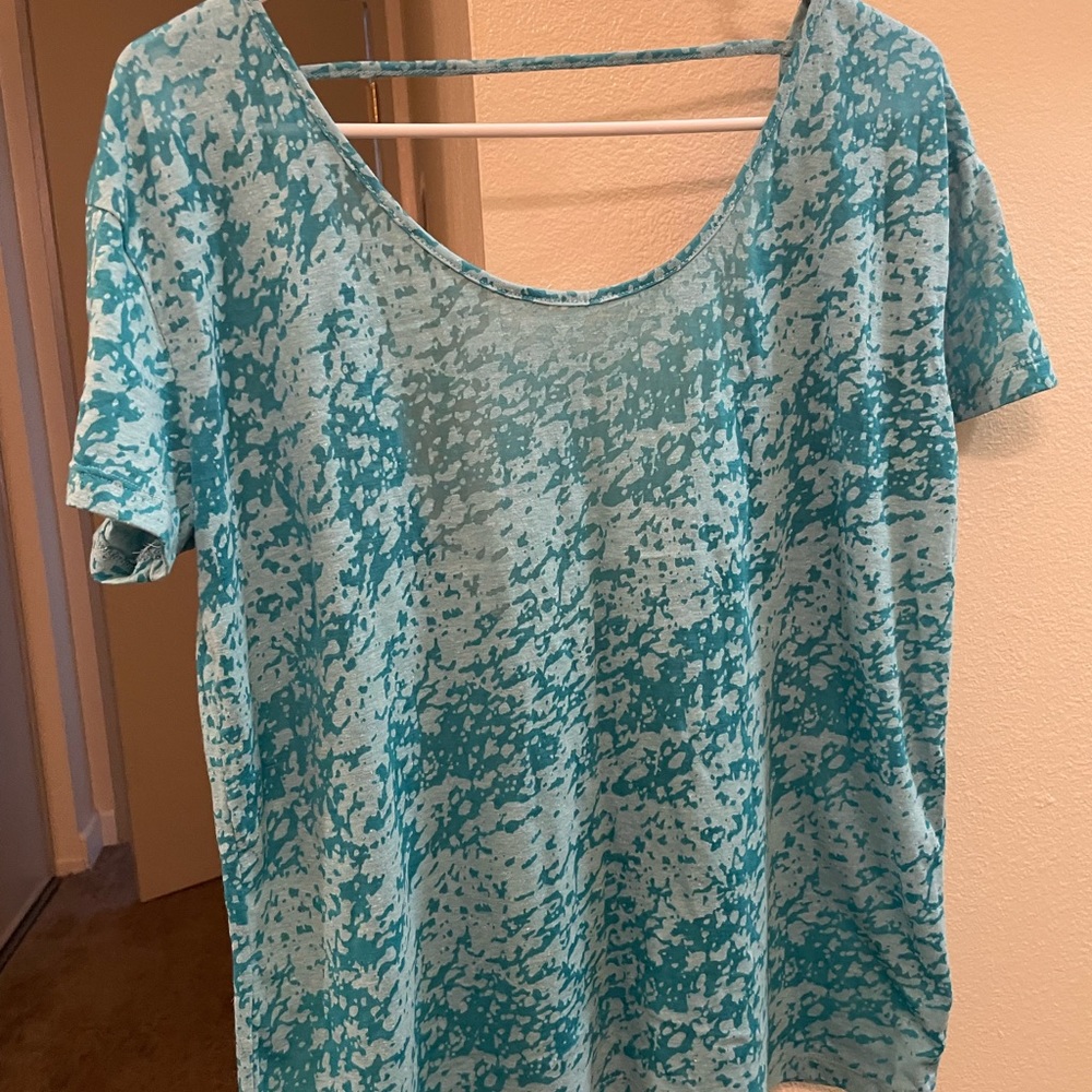 New, never worn, slightly see through